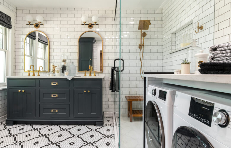 Master bathroom with walk-in shower and laundry machines