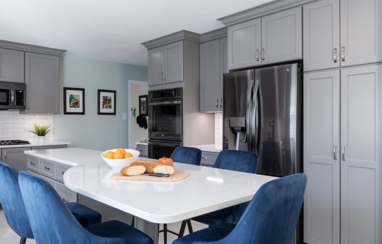 Unique Kitchen Island with blue velvet chairs