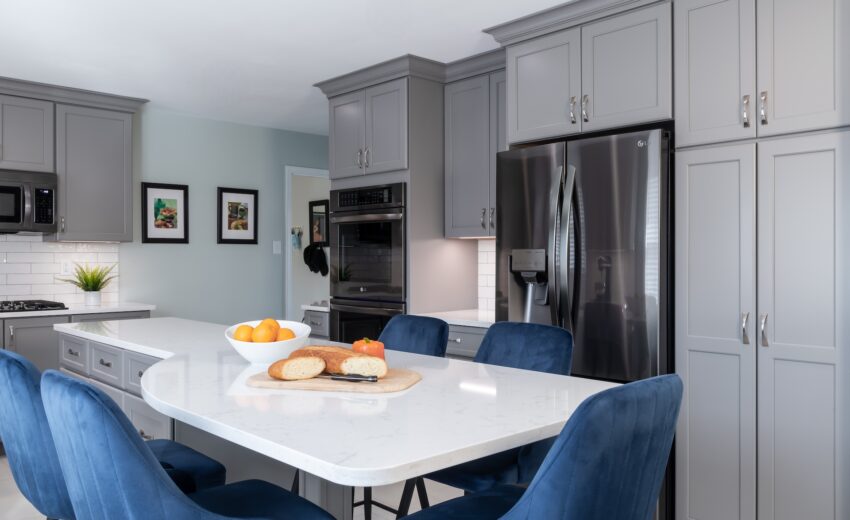 Unique Kitchen Island with blue velvet chairs